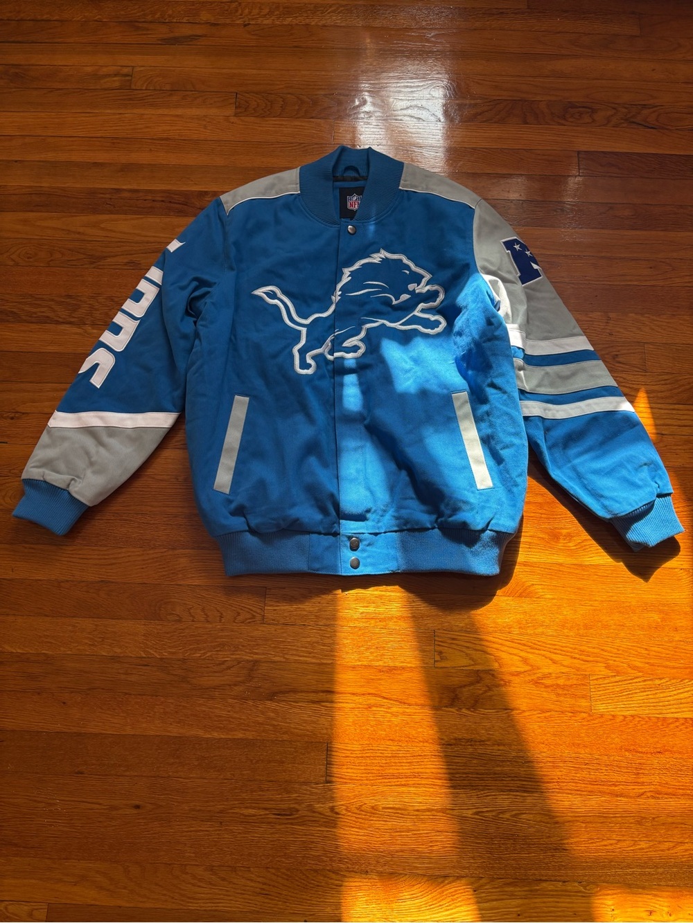 NFL Detroit Lions Blue and Gray Varsity Bomber Jacket